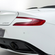 Illustration for article titled This Aston Martin Vanquish Has Elegant Easter Eggs In The Controls